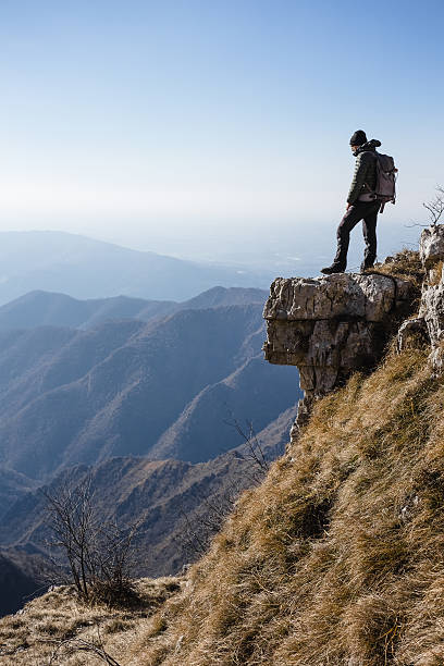 istock Climber watches a mountain valley 638226832