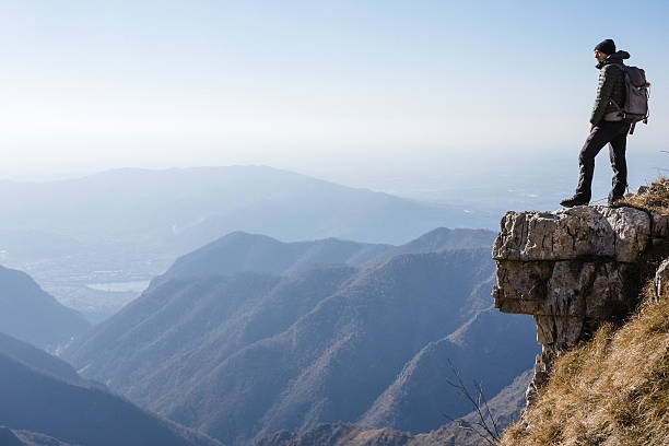 istock Hiker watches a mountain valley 638226880