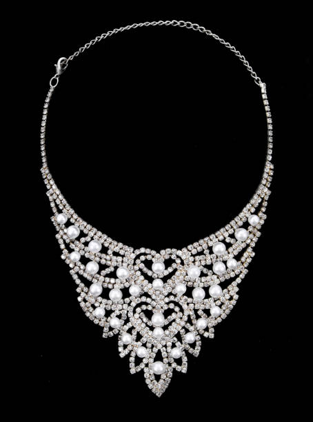 istock Diamonds and pears necklace isolated on black background. 638231734