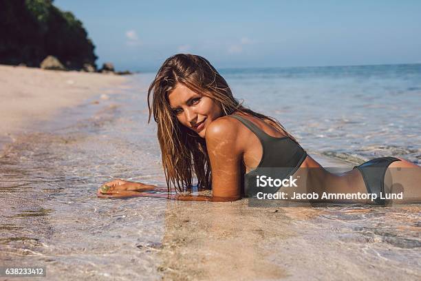 Beautiful Bikini Model Relaxing On The Beach Stock Photo - Download Image Now - Fashion Model, Beach, Women
