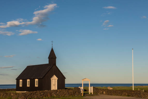 istock Budakirkja with Gate Iceland Evening 638234328