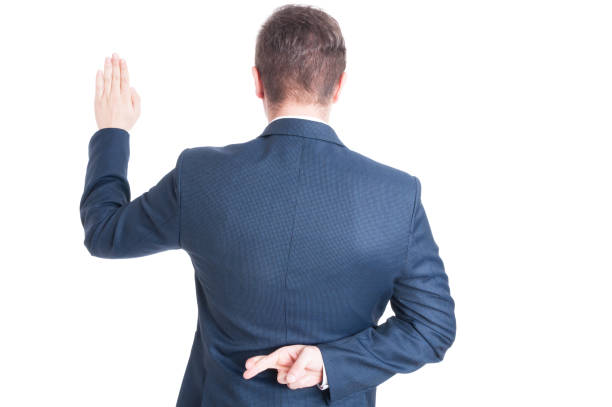 istock Back view of taking oath and holding fingers crossed 638237308