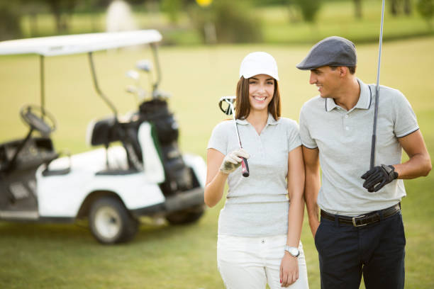 istock Young couple at golf cart 638238274