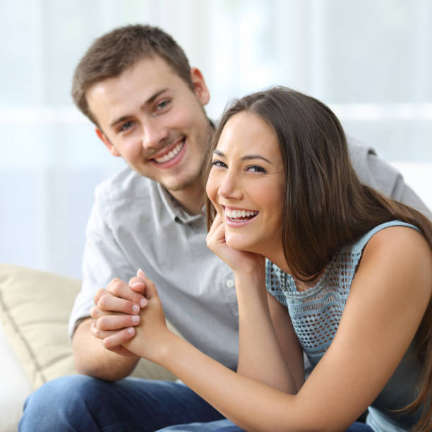 istock Happy couple posing at home 638239152