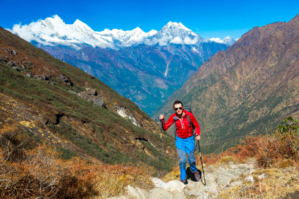 istock One young Hiker walking on Mountain Trail Peaks on Background 638239338