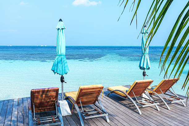 istock Sunbeds on the sea view terrace 638240472