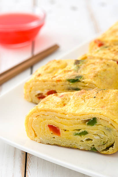 istock Traditional tamagoyaki Japanese omelette and sauce 638245396
