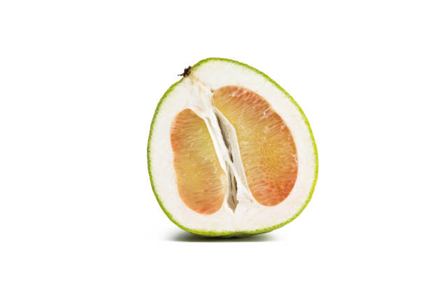 istock close-up view of Cut half pomelo isolated on white background. 638248844