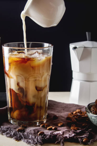istock Iced coffee with milk. Summer drink. Dark background. 638250262
