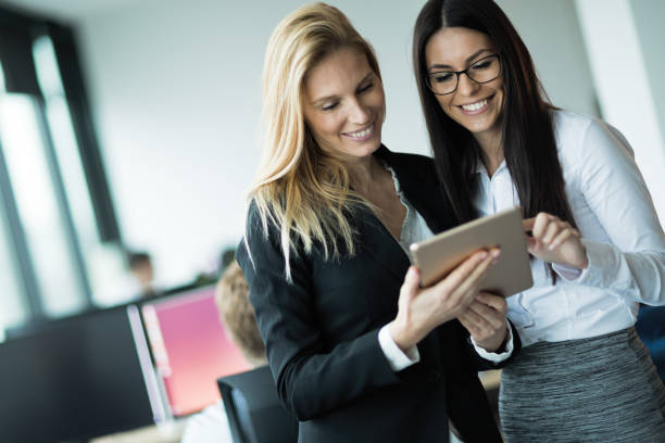 istock Business women working at IT company 638250364