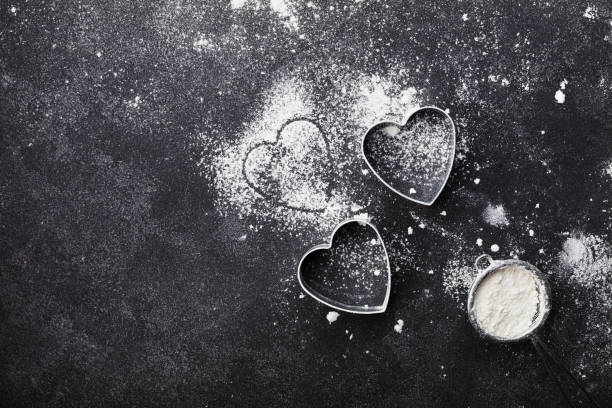 istock Baking background with flour and heart shape for Valentines day. 638250926