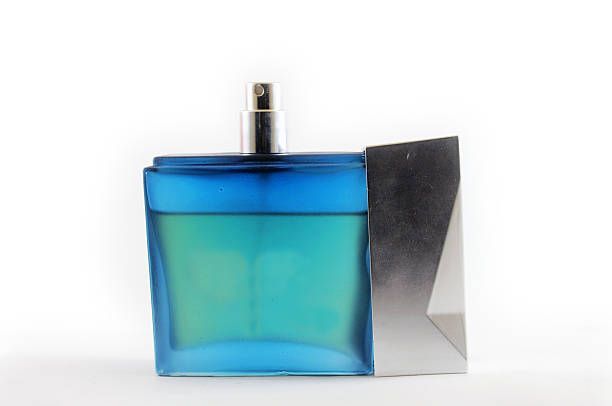 istock Blue opened perfume bottle isolated on white background 638252102