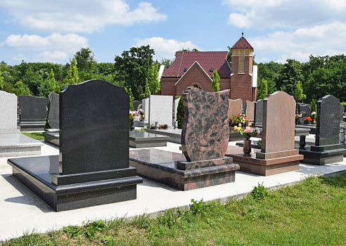 Tombstones and a chapel in the public cemetery