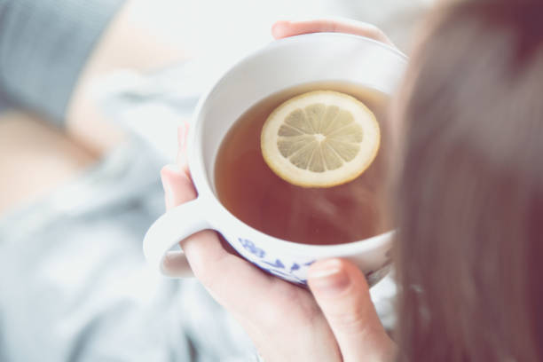 istock Cozy winter concept with girl drinking hot tea 638254054