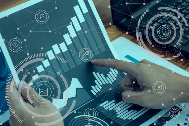 istock Business workers discussing digital graphs and diagrams indicati 638254766
