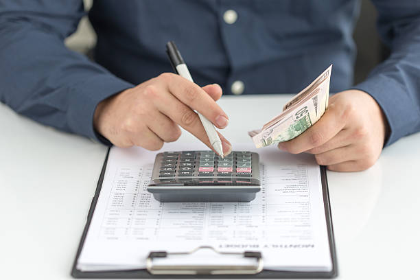 istock Financing Accounting Banking Concept: Man Counting Money 638255276