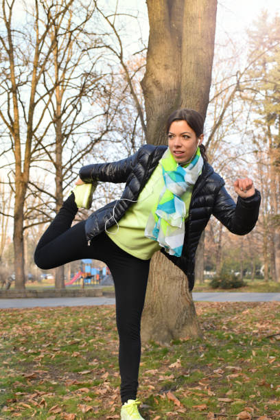 istock Fitness woman stretching her muscles before training 638255504
