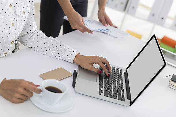 istock Woman typing and drinking coffee 638258288