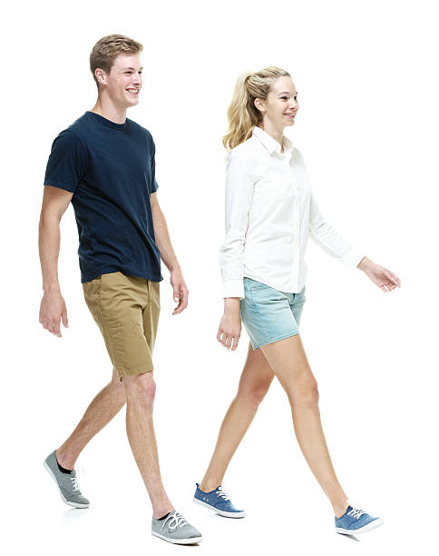 istock Smiling couple walking together 638261802