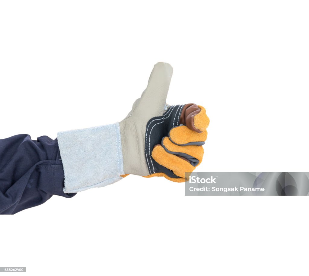 Hand with the thump up in rough leather glove Working hand with the thump up in rough leather glove isolate on white background Glove Stock Photo
