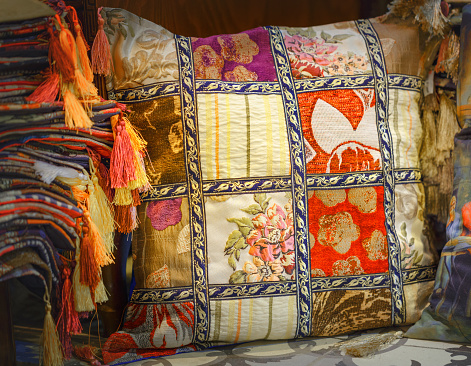 Ethnic Turkish pillow at grand bazaar in Istanbul, Turkey. Home textile.