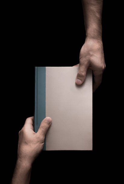 istock book in male hands 5 of 6 638264298