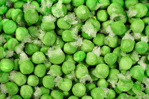 frozen green peas with ice crystals