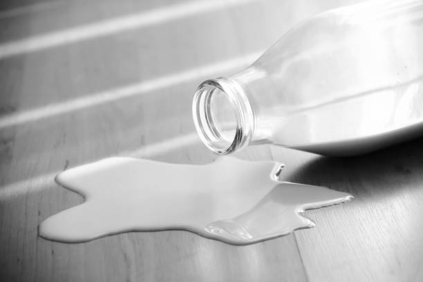 istock Milk Bottle On The Wooden Ground 638265652