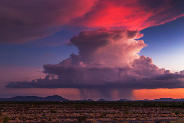 sonnenuntergang sturmwolken - monsoon stock-fotos und bilder