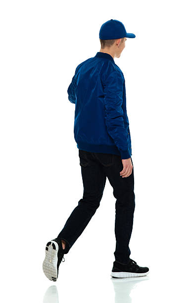 istock Rear view of male walking 638269798