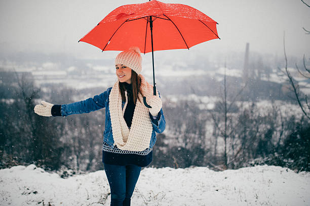 istock Happy girl with umbrella 638272006