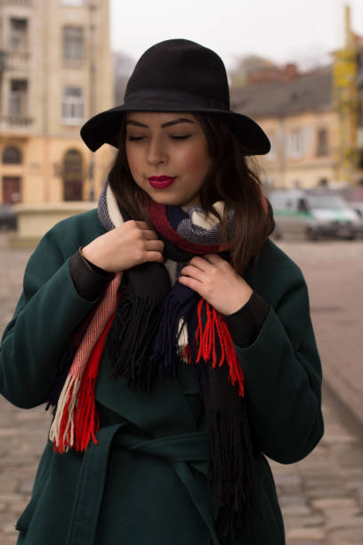 istock Pretty model in hat and coat at the street 638273056