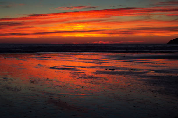 istock Colourful sunset over the beach at Polzeath 638273670