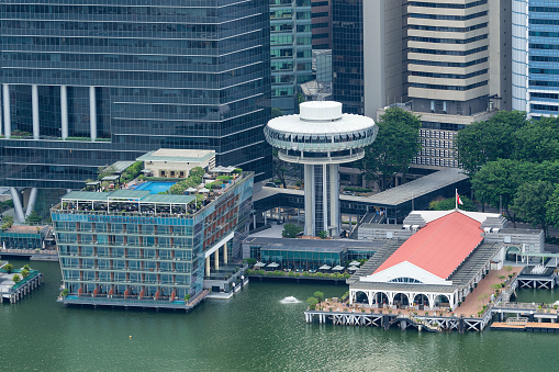 Singapore, Singapore - December 12, 2016: high view of city landscape building at Marina Bay from sky park of Marina Bay Sands, Singapore