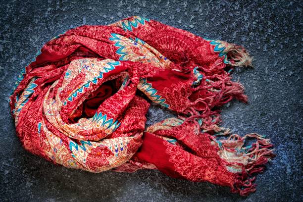 istock women's scarf on dark cement background 638275056