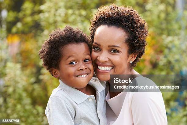 Portrait Of Young African American Mother With Toddler Son Stock Photo - Download Image Now