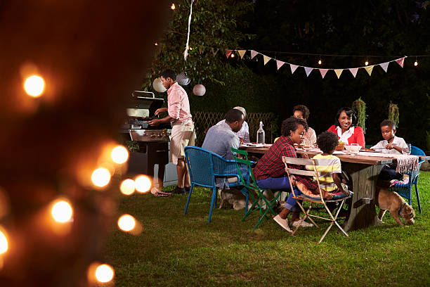 istock Multi generation black family enjoying a barbecue dinner 638288200