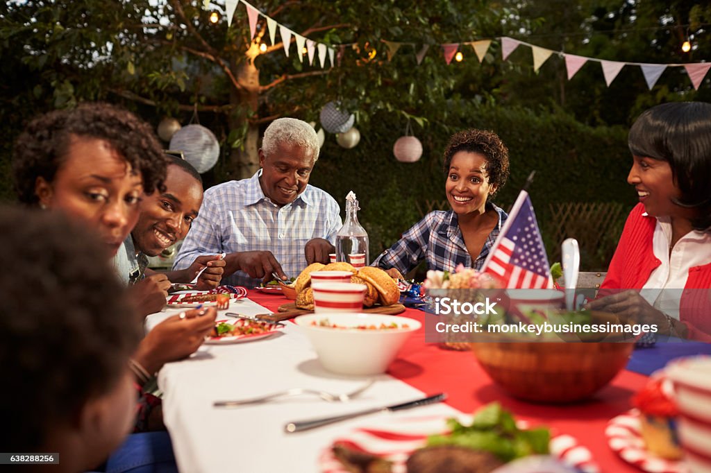 Happy multi generation black family at 4th July barbecue Fourth of July Stock Photo