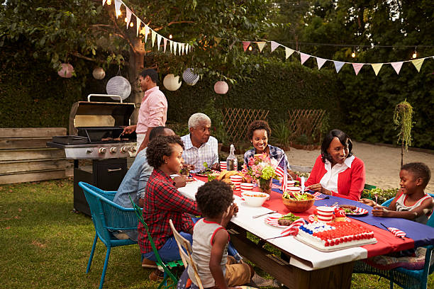 istock Multi generation black family having a 4th July barbecue 638288280