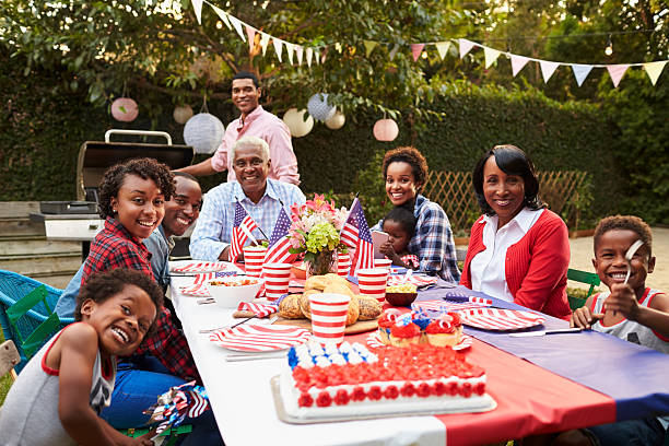 istock Multi generation black family having a 4th July garden party 638288318