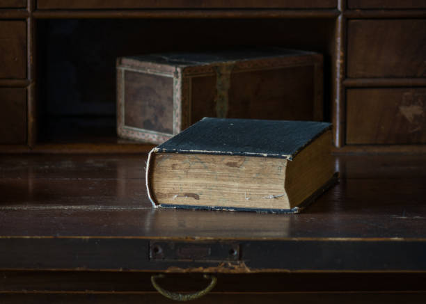 istock The old and vintage book on a wooden table 638295498