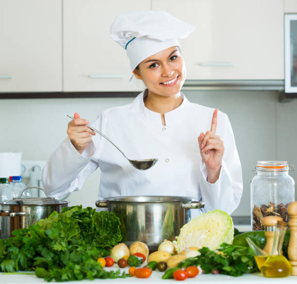 istock female cook vegetarian meal 638299864