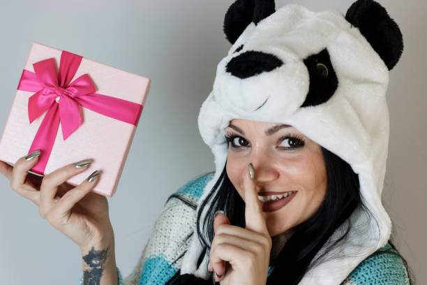 istock Girl holds a gift box 638300154
