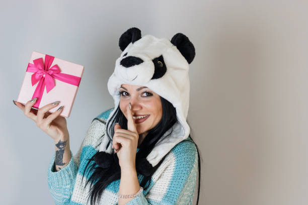 istock Girl holds a gift box 638300192