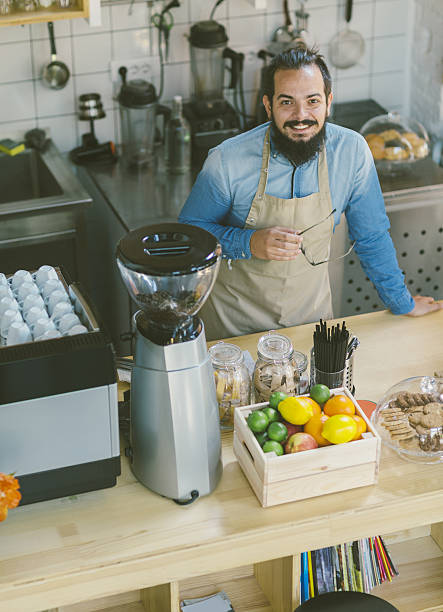 istock Bearded Man In His Smoothie Cafe 638302694