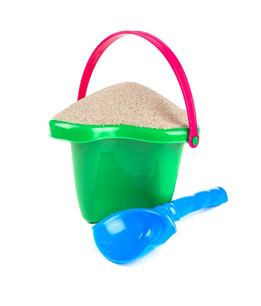 istock beach sand, shovel and bucket 638302858