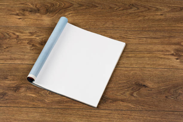 istock Mock-up magazines or catalog on wooden table background. 638303666