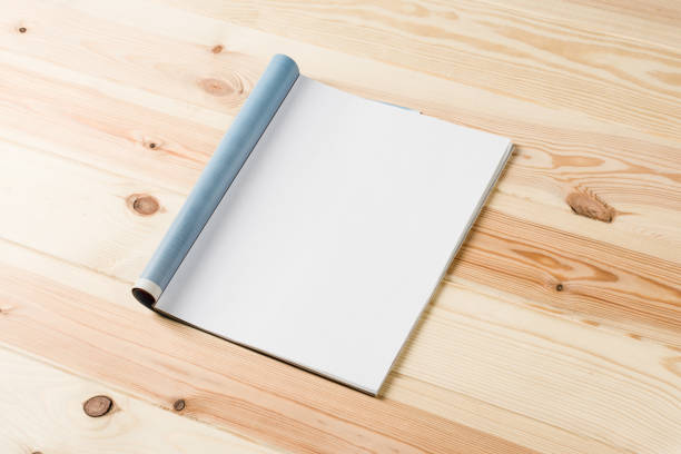 istock Mock-up magazines or catalog on wooden table background. 638303750