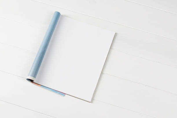 istock Mock-up magazines or catalog on wooden table background. 638303830