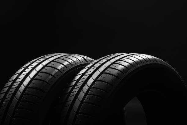 istock Summer fuel efficient car tires on black background 638304474